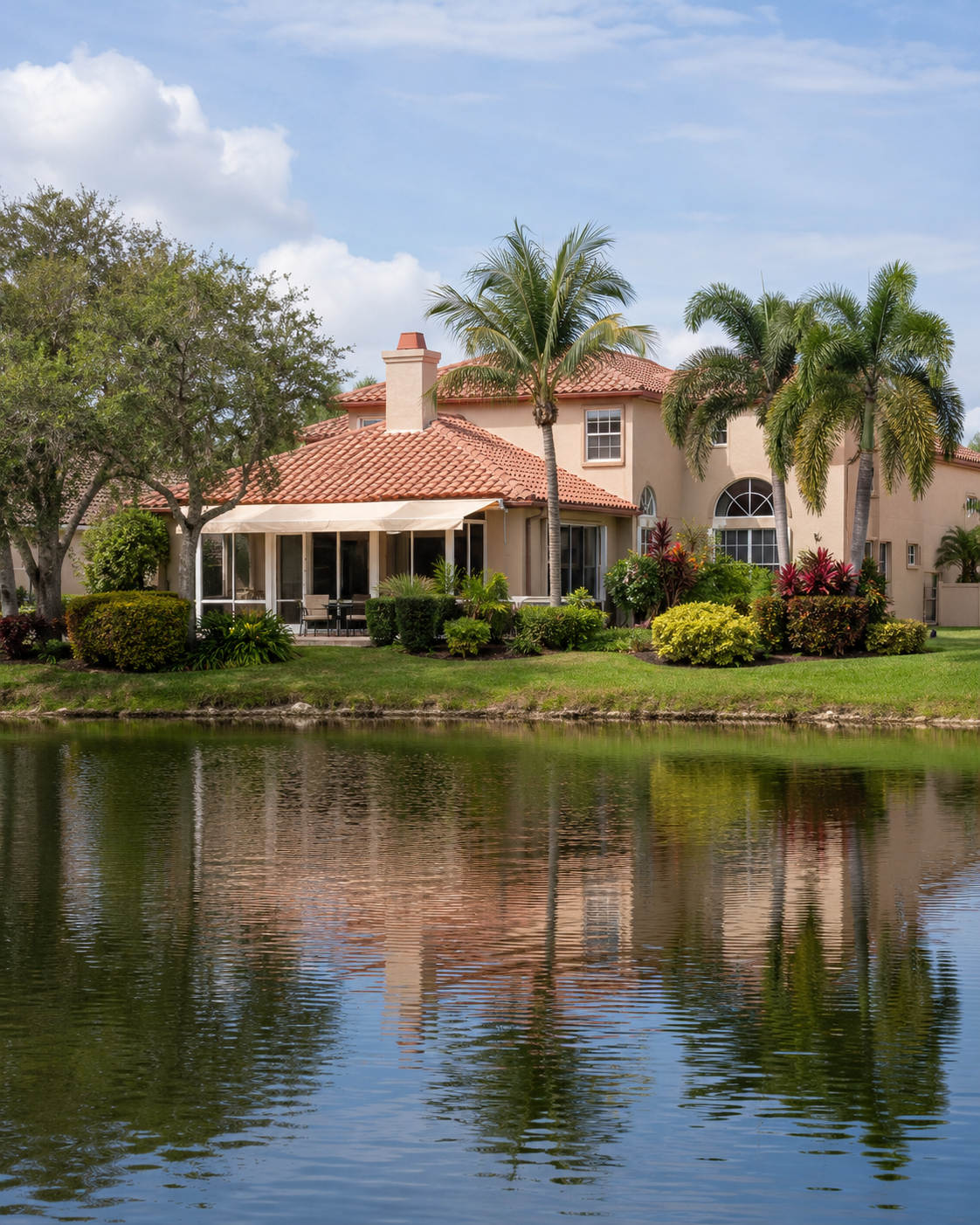 Coastal-Mediterranean home by a community lake in the Bermuda Cay community, Boynton Beach