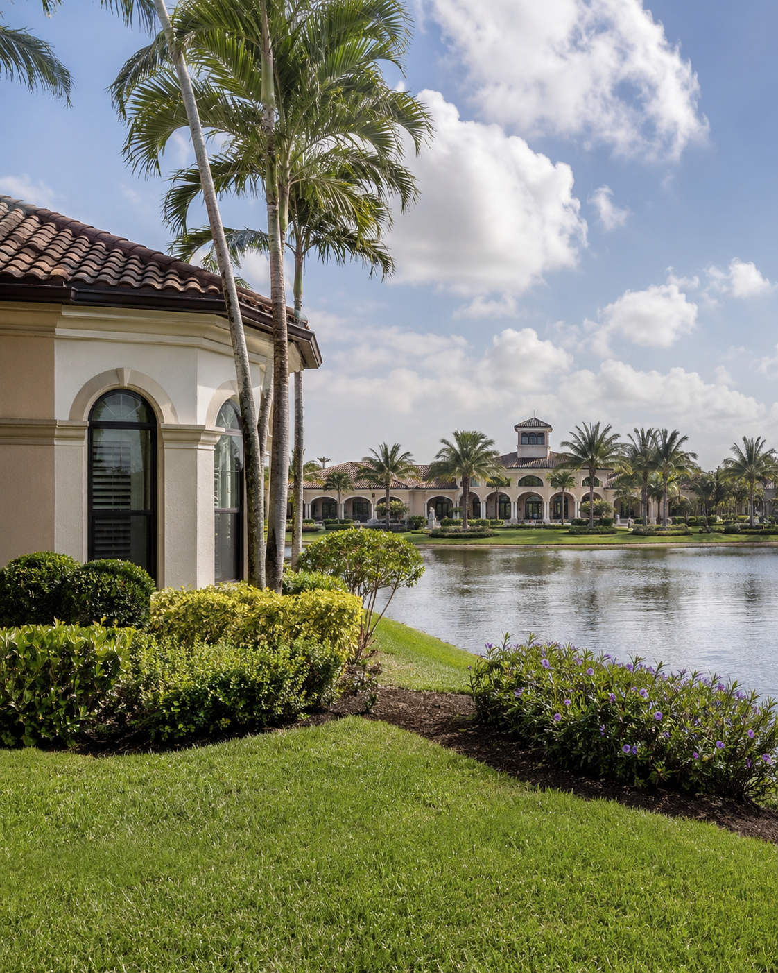 Mediterranean home by a lake and resort clubhouse in a Valencia community, Boynton Beach