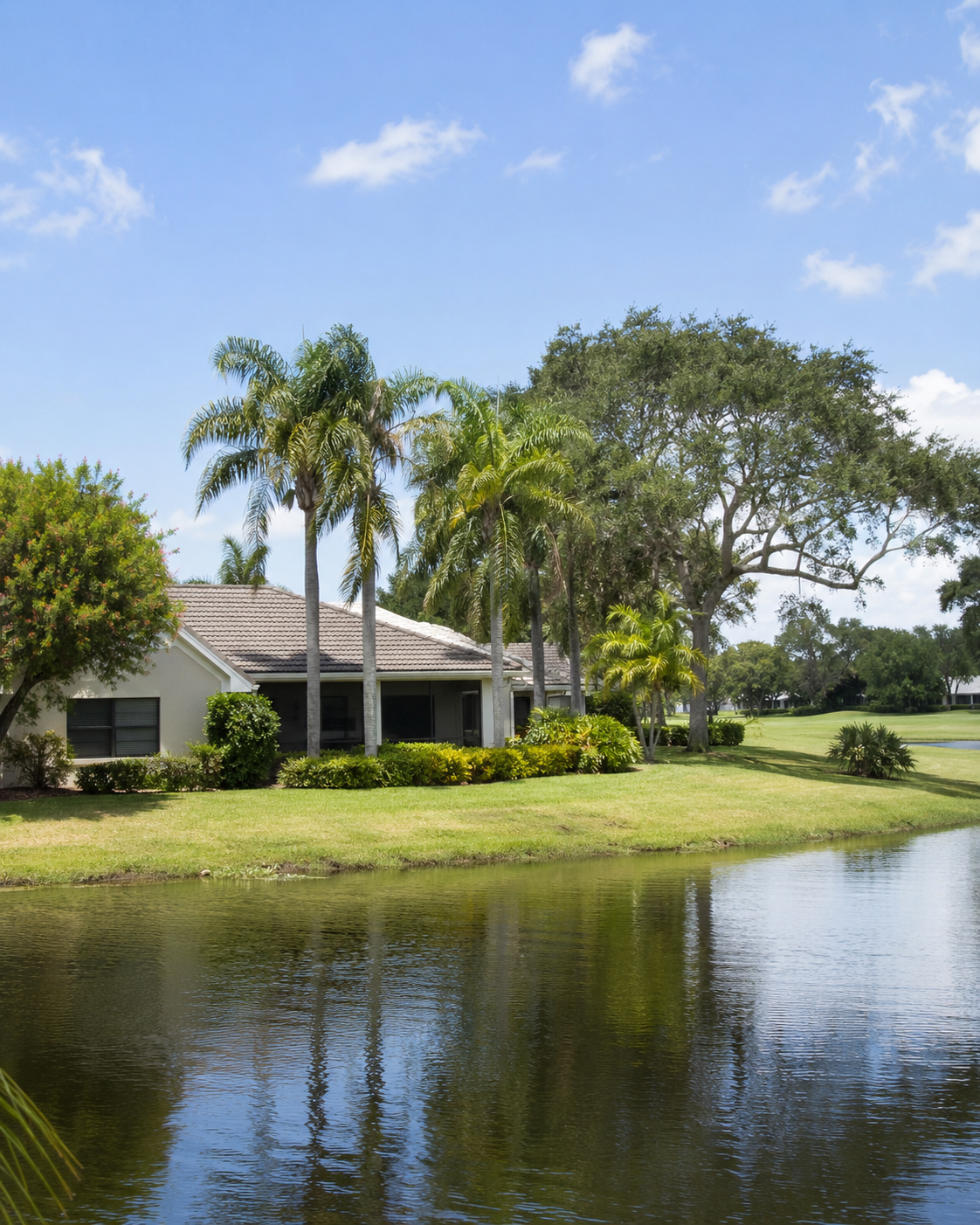Home beside a lake and golf greens in the Lakeview neighborhood, Delray Beach