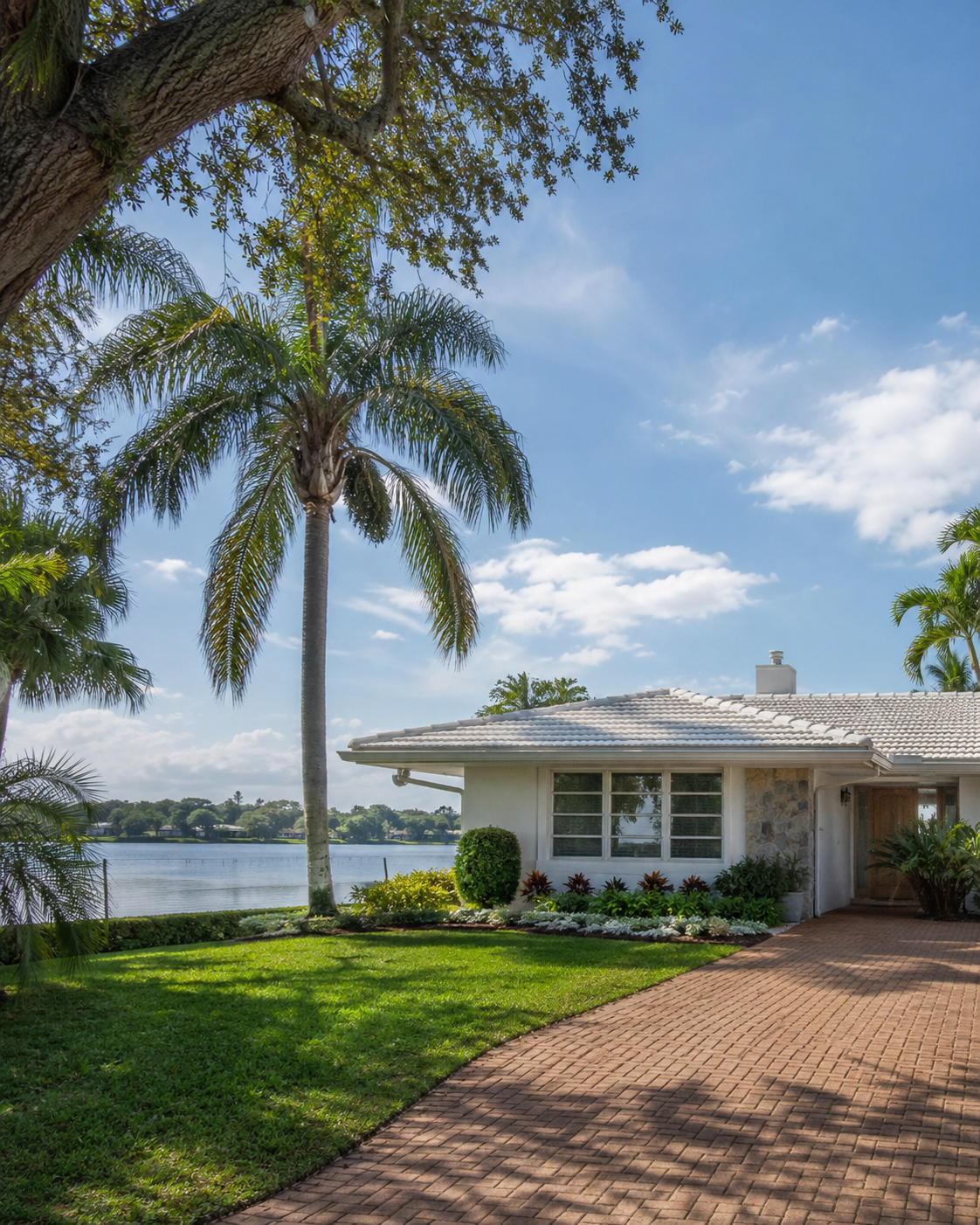 Midcentury ranch home near the shore of Lake Osborne in Lake Osborne Heights, Lake Worth Beach