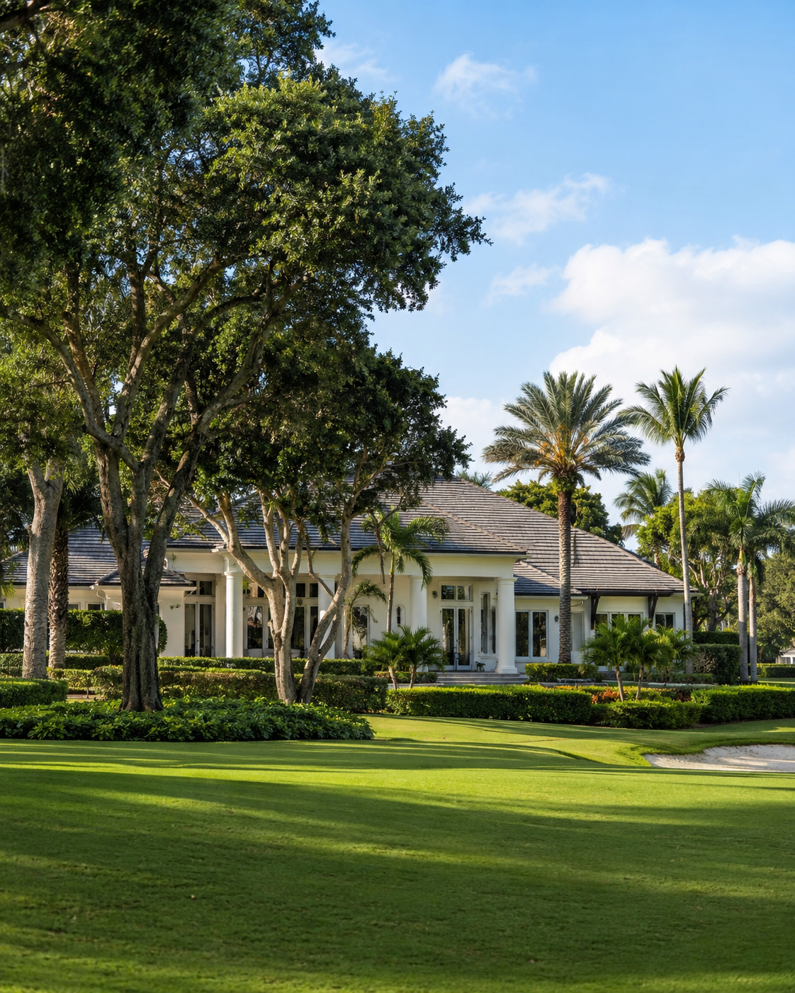 Home on a tree-lined golf fairway in the Eastpointe community, Palm Beach Gardens
