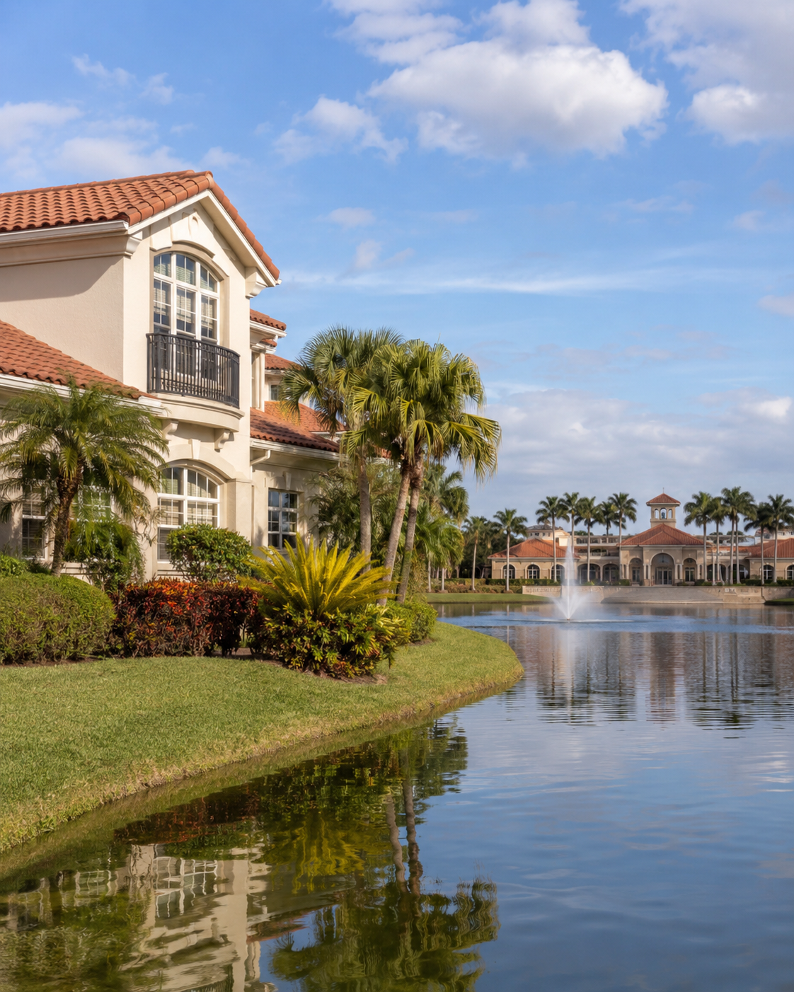 Mediterranean family home beside a community lake in the Andros Isle community, West Palm Beach